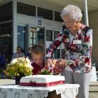 Former Awamangu School ex-pupil Gwen Treacy (91) and Clutha Valley Primary School pupil Toby...