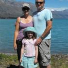 Former Queenstown locals Kiri, Garry and Aria Ferris, now living in Queensland,  stand at the top...
