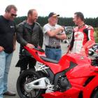 Former World Superbike Championship runner-up Aaron Slight (right) talks to Burt Munro Challenge...