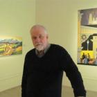 Forrester  Gallery director Warwick Smith with two  works by Colin Wheeler. Photo by Andrew Ashton.
