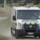 Four alleged car thieves are taken away to face charges, after a two-hour manhunt in Waianakarua...