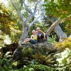 Fran and Mike Rawling relax, with dog Onyx, in their Wylde Willow garden in Abbotsford, Dunedin,...