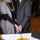 Author Alexa Johnston and Dunedin Mayor Peter Chin cut the birthday veal and ham pie to celebrate the birth of Frances Hodgkins and officially open the Frances Hodgkins: Femme du Monde Exhibition at the Dunedin Public Art Gallery. Photo by Jane Dawber. 
