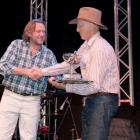 Francesco Botto Poala, of Reda, presents Bill Sutherland with the Otago Merino Association clip...