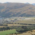 Frankton Flats and Queenstown Airport, as seen from the slope of the Remarkables. Photo by James...