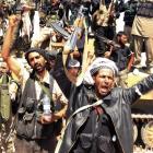 Free Syrian Army fighters rejoice after seizing the town of Khanasir, a strategic town in...