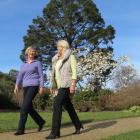 Friends of the Dunedin Botanic Garden tour guides founder Annette Riley (left) and new co...