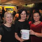 Frock Friday fundraising event organiser Bernadette Hyland (right) with Tracey Gamble (left) and...