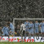 Fulham's Chris Baird takes a free kick against Manchester City at the Etihad stadium in...
