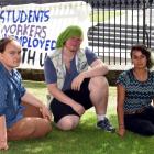 Gareth McMullen (20, left), Tyler West (20) and Roshana Fernando (21) outside the University of...