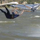 Gareth Wood, of Dunedin, the 2008 champion, practices for the national windsurfing slalom...