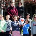 George Street Normal School pupils and teachers (from left) Hannah George (10), Tiana Hill (10),...