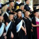 Georgie Austin-Ellas (23, centre) was one of the hundreds of University of Otago graduands to...