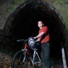 Gerard Hyland is seen at the entry of the old Caversham railway tunnel in this file photo. Photo...