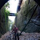 Gerard Hyland with his bike at the entry of the old Caversham Valley railway tunnel. Photo by...