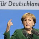 German Chancellor and head of the Christian Democratic Union party Angela Merkel gestures during...
