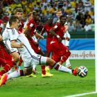 Germany's Miroslav Klose (front) taps the ball in to score against Ghana. REUTERS/Eddie Keogh