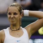 Germany's Sabine Lisicki reacts during her match against China's Li Na at Wimbledon.  (AP Photo...