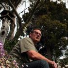 Getting some protection . . . Dunedin Amenities Society member Paul Pope sits under the trees at...