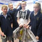 Getting their costume sorted out are Lawrence Area School pupils (from left) Lochie Bain (12),...