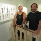 Gisborne artists Simon Lardelli (left) and Drew Hill present the raw material of pallets they use...