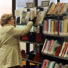 Giselle Steiner, of Dunedin, looks at a book at Dunedin City Library. Photo by Craig Baxter.