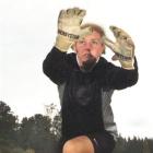 Goalkeeper Rebekah Brook, of the Northern club, warms up before a training session in front of...