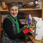 Grace Oxwell works on her latest project after finding out her World of WearableArt entry had...