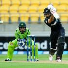 Grant Elliott led the way for New Zealand with bat and ball against Pakistan during their first...