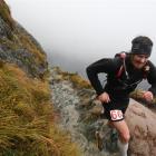 Grant Guise at the Harris Saddle, on his way to winning the men's title at the 2010 Routeburn...