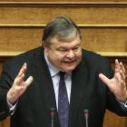 Greek Finance Minister Evangelos Venizelos addresses lawmakers in the Greek Parliament in Athens....