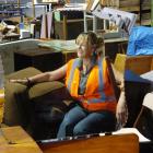 Green Island Landfill Recovery Store manager Kathy Abernethy reflects on some of the furniture...