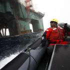 Greenpeace head Kumi Naidoo prepares to do battle last month in a Greenpeace oil protest in the...