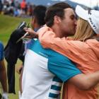 Griffin kisses girlfriend Liz Johnston. Photos by www.photosport.nz