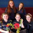 Tahuna Intermediate pupils check progress on one of the 100 poppy seedlings they are  growing ...
