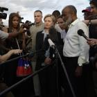 Haiti's President Rene Preval, right, answers questions from the press as U.S. Secretary of State...