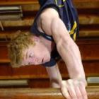 Taieri College gymnast Hamish  Johnson demonstrates his  strength on the parallel bars at the  school's gym earlier this week. Photo by Jane Dawber.