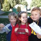 Hawea Flat School pupils (from left) Jonathon Wing, Keira Beston and Levi Boyd (all 6) with their...