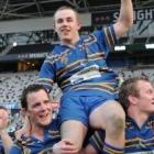 Hayden Parker, seen being carried off the field after Taieri's victory in the Dunedin premier...