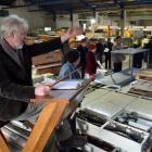 Hayward's auctioneer Kevin Hayward brings the hammer down on another lot at the University of...