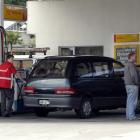 High fuel prices earlier this year are funneling through economic data and contributing to the...