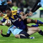 Highlander's Fetu'u Vainikolo against the Waratahs in the Super 14 Rugby match at Rugby Park...