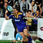 Highlanders flanker John Hardie celebrates his try against the Waratahs at Forsyth Barr Stadium...