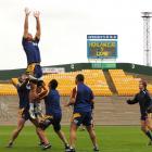Highlanders going through a line-out routine at Carisbrook yesterday are (from left) Jamie...