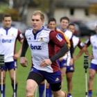 Highlanderslock Josh Bekhuis gets up speed at a training at Logan Park earlier this week. Photo...