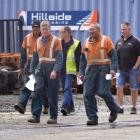 Hillside workers leave a meeting with KiwiRail chief executive Jim Quinn, who yesterday announced...