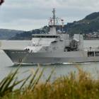 HMNZS Otago leaves Otago Harbour yesterday. Photos by Peter McIntosh.