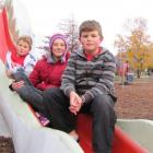 Holidaymakers Stirling Newlands, Grace Mitchell and Corbin Newlands, all of Christchurch, enjoy...