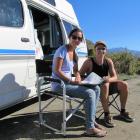 Honeymooners Claudia and Urs Widmer, of Lucerne, Switzerland, who are following the rules while...