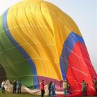 Hot-air ballooners are encouraged to help expel air from the balloon once landed. Photos by Rosie...